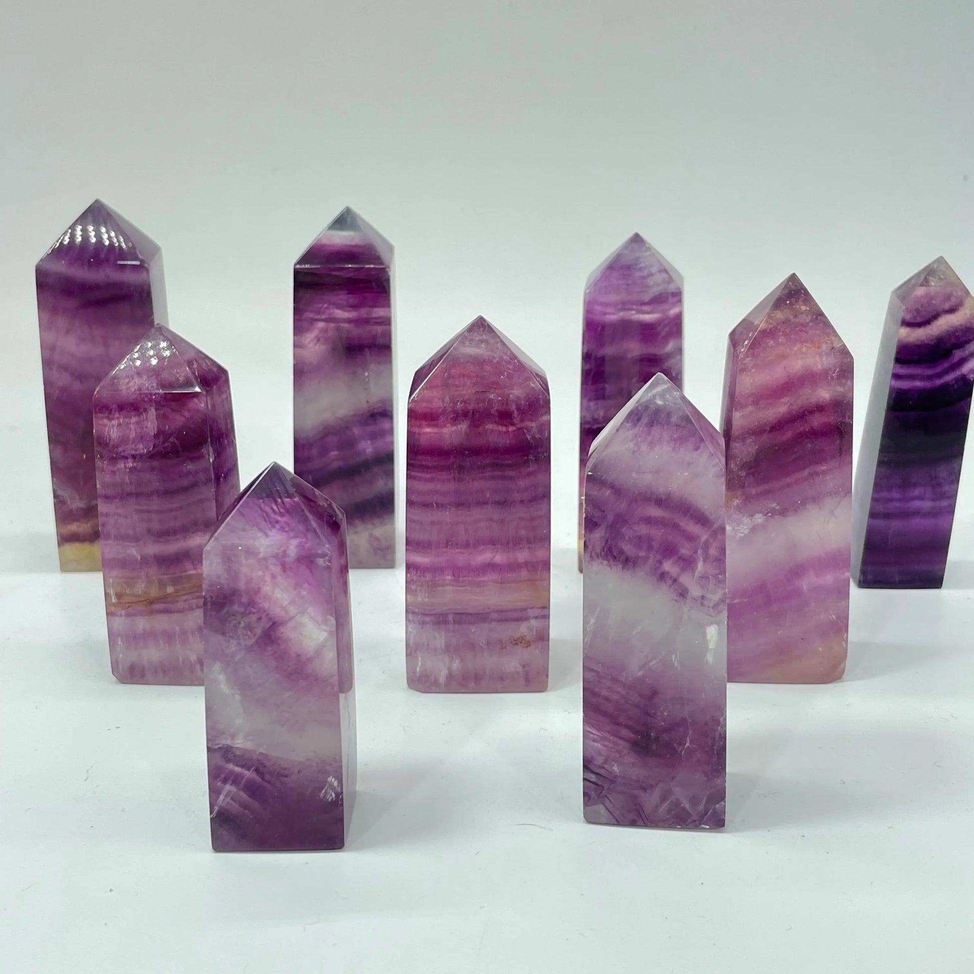 Purple fluorite tower four faced wholesale UV crystal